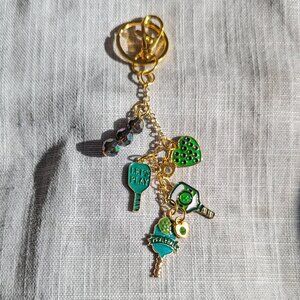 PICKLE BALL KEYCHAIN GREEN & GOLD BAG CHARM